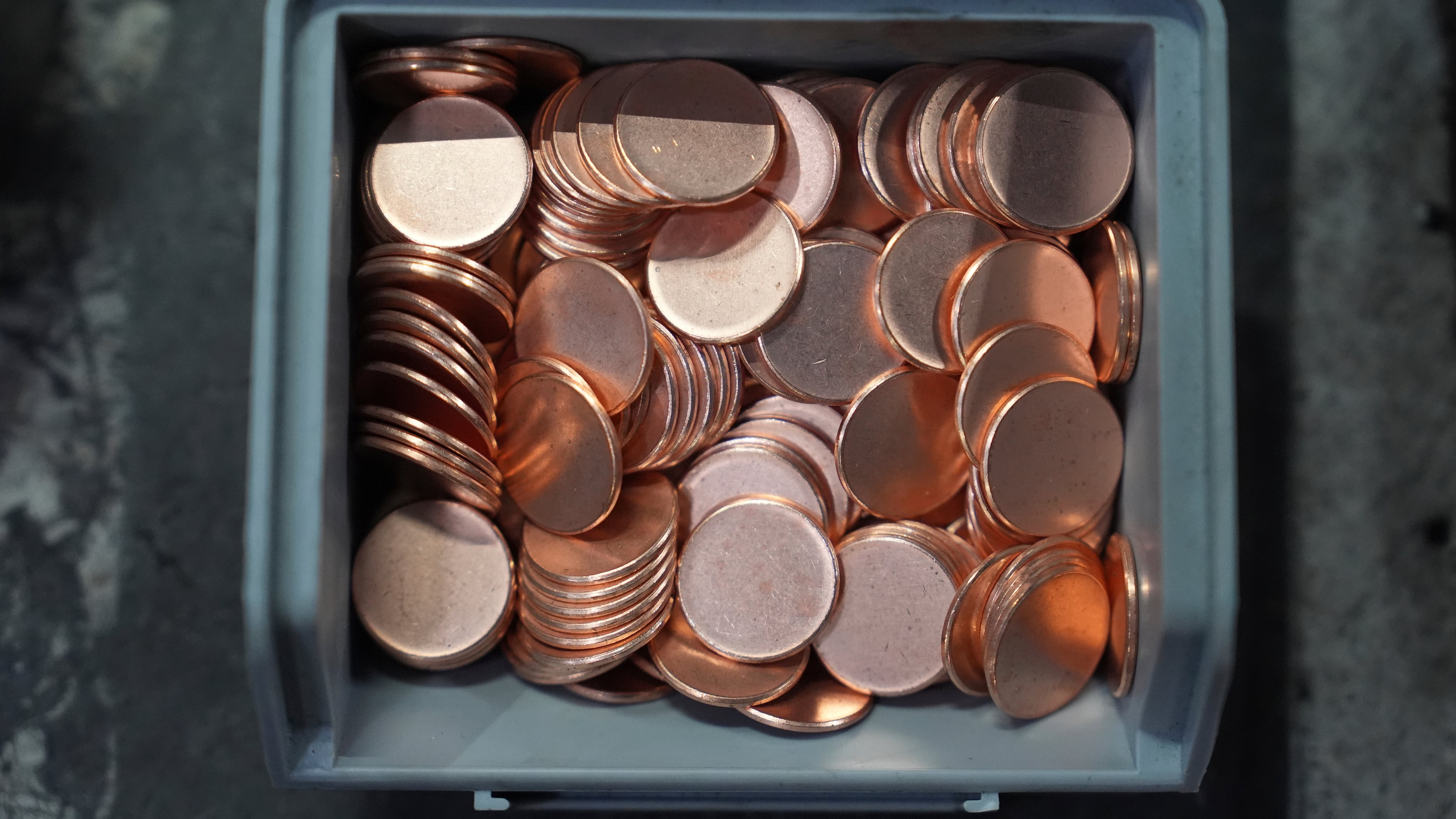 Blank coins wait to be the last pennies pressed at the U.S. Mint in Philadelphia, Wednesday, Nov. 12, 2025. (AP Photo/Matt Slocum)