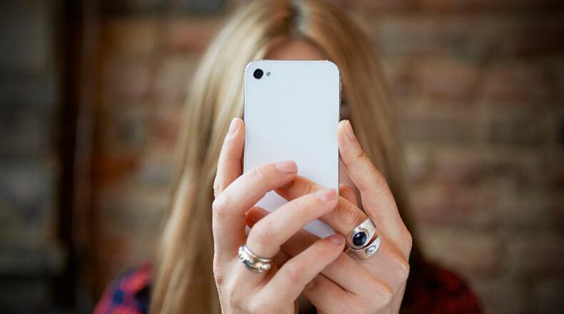 Woman taking a selfie (stock photo).