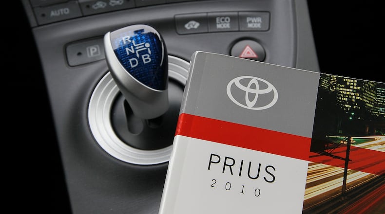 SAN FRANCISCO - FEBRUARY 04: An owners manual is shown on the console of a 2010 Toyota Prius hybrid car February 4, 2010 in San Francisco, California. The National Highway Traffic Safety Administration (NHTSA) has reportedly said it would look into reports from consumers about brake problems on 2010 Prius,. (Photo Illustration by Justin Sullivan/Getty Images)