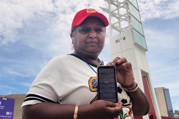 Bina Ramroop holds proof of the ticket she bought through StubHub for the World Cup Group H soccer match between Spain and Cape Verde in Atlanta on Monday, June 15, 2026. (Emilie Megnien/AP)