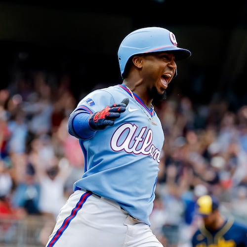 Atlanta Braves' Ozzie Albies celebrates after hitting the winning two-run home run against the Milwaukee Brewers during the ninth inning of a baseball game, Saturday, June 20, 2026, in Atlanta. (AP Photo/Erik S. Lesser)