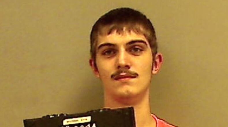 Hopefully the jail barber gives him a new haircut.