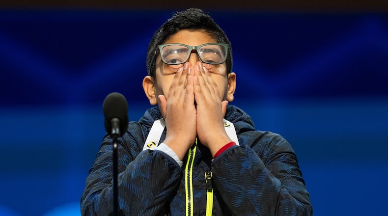 Anay Mahesh, 13, of Orlando, Fla., reacts after answering incorrectly during the quarterfinals of the Scripps National Spelling Bee, Wednesday, May 27, 2026, in Washington. (AP Photo/Allison Robbert)