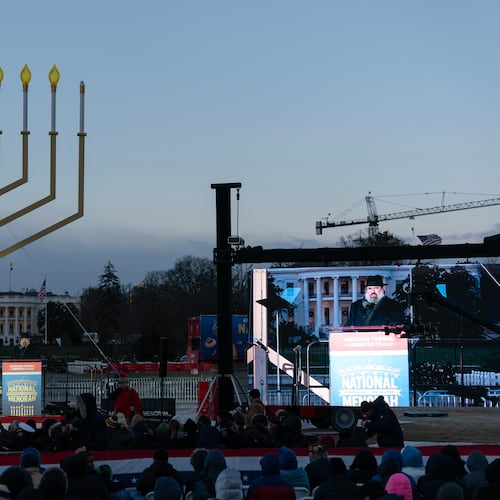 FILE - Rabbi Levi Shemtov speaks to the crowd before he lights the Menorah during the annual National Menorah Lighting in celebration of Hanukkah, on the Ellipse near the White House in Washington, Dec. 14, 2025. (AP Photo/Jose Luis Magana, File)