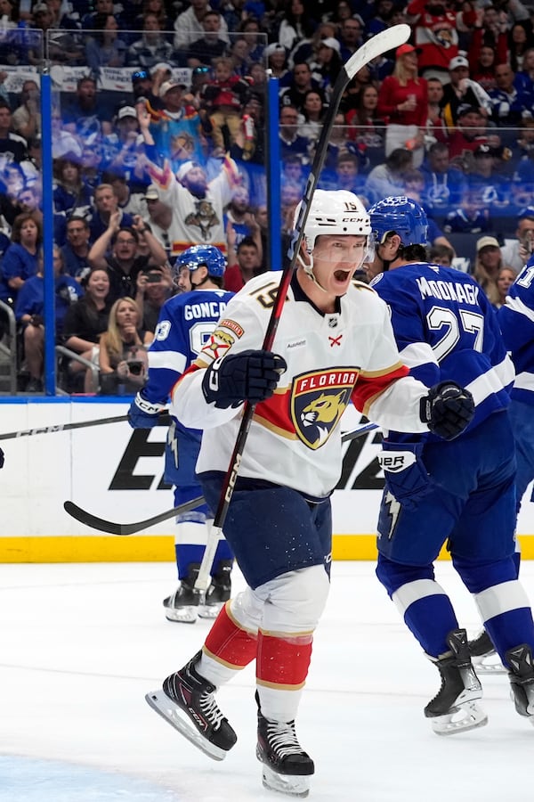 Florida Panthers center Anton Lundell (15) celebrates after scoring against the Tampa Bay Lightning during the first period in Game 5 of an NHL hockey Stanley Cup first-round playoff series, Wednesday, April 30, 2025, in Tampa, Fla. (AP Photo/Chris O'Meara)