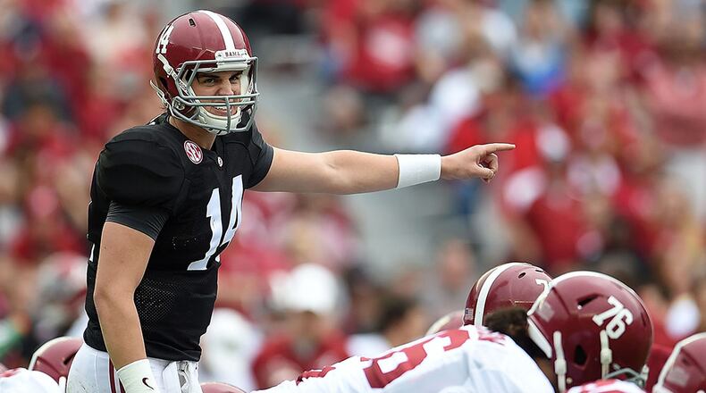 TUSCALOOSA, AL - APRIL 18: Jacob Coker #14 of the White team calls a play against the Crimson team during the University of Alabama A Day spring game at Bryant-Denny Stadium on April 18, 2015 in Tuscaloosa, Alabama. (Photo by Stacy Revere/Getty Images)