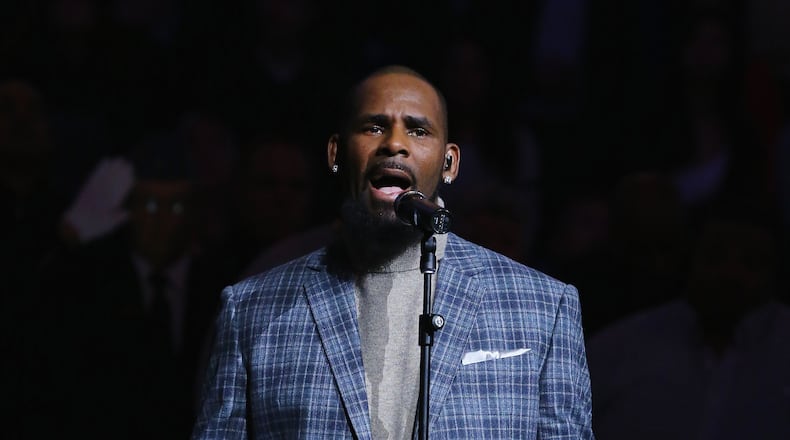 NEW YORK, NY - NOVEMBER 17: Singer R. Kelly sings the National anthem before the Brooklyn Nets vs the Atlanta Hawks at The Barclays Center on November 17, 2015 in New York City.
