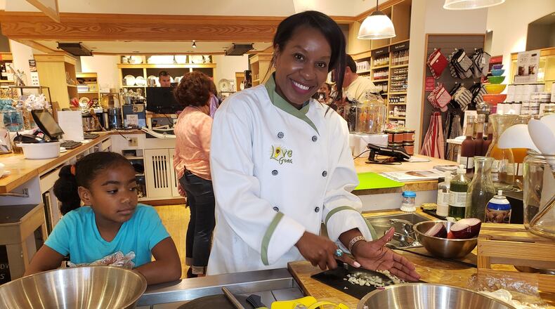 Earlier this summer, Tasha Roberts of Love Guac and her daughter Aijalon demonstrated the fine art of making guacamole at the Williams Sonoma store in Peachtree City. CONTRIBUTED BY LOVE GUAC