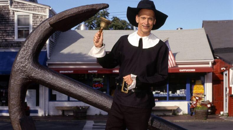 Visual artist and director John Waters in a self-portrait as a town crier.