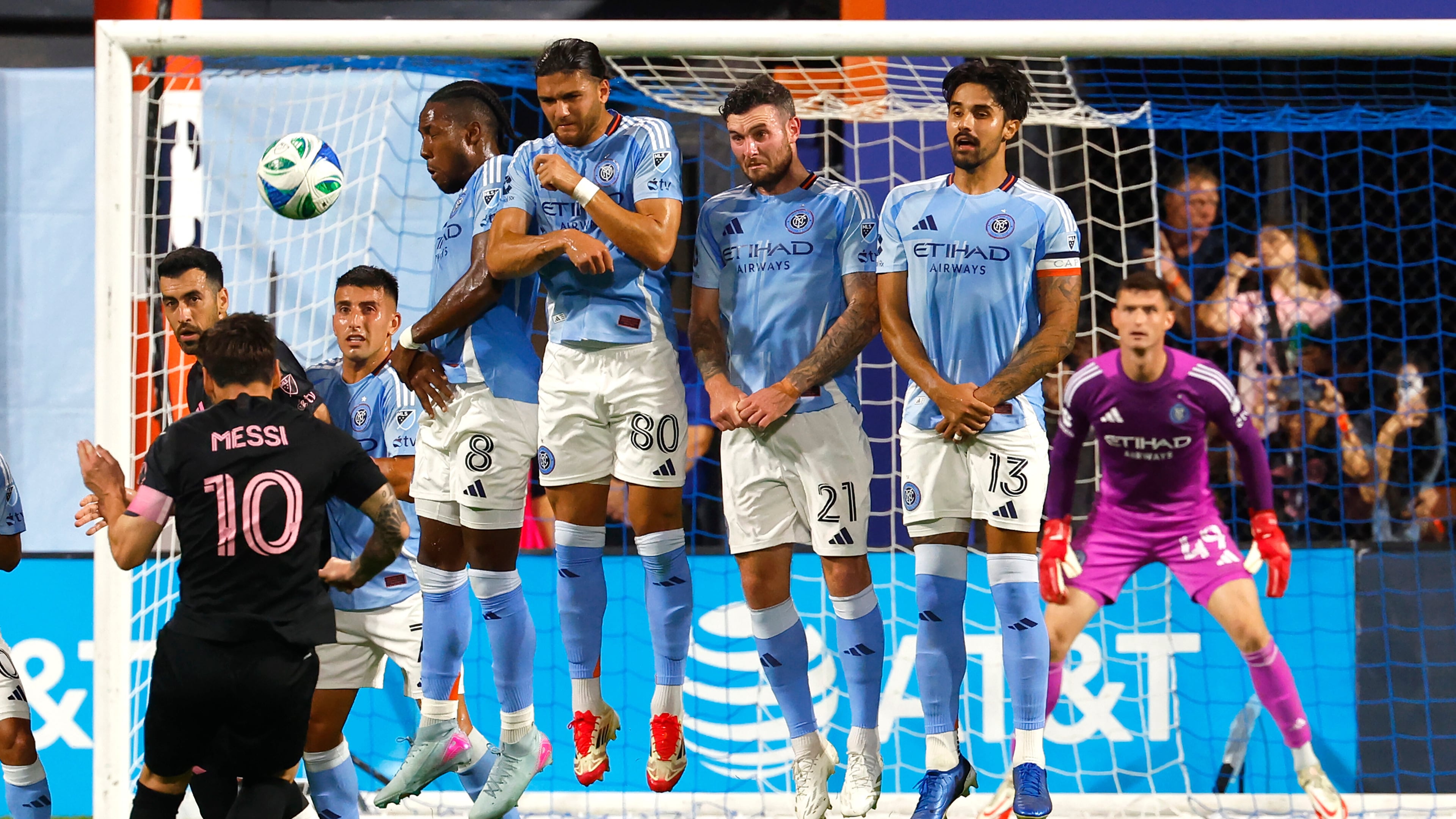 New York City FC defend a direct kick by Inter Miami forward Lionel Messi (10) during the first half of a MLS soccer game, Wednesday, Sept. 24, 2025, in New York. (AP Photo/Noah K. Murray)
