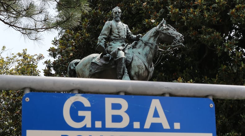 061420 Atlanta: The bronze statue of John Brown Gordon in full Confederate regalia atop his horse Marye sits behind a police line at the Capitol Building on Sunday, June 14, 2020, in Atlanta. Unveiled in 1907, the statue of the former Georgia governor and U.S. senator is one of the most controversial monuments to the Old South on the Capitol grounds, and is frequently at the center of protests and calls for removal. Thousands of protesters are expected on Monday morning when the Georgia General Assembly returns to the Capitol to finish possibly the oddest legislative session on record. Curtis Compton ccompton@ajc.com