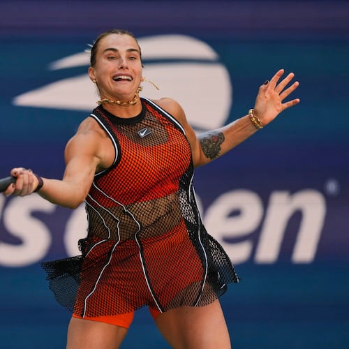 Aryna Sabalenka, of Belarus, returns the ball during a mixed doubles match at the U.S. Open tennis championships, Tuesday, Aug. 25, 2026, in New York. (AP Photo/Yuki Iwamura)