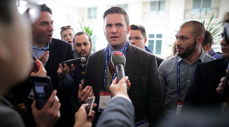 NATIONAL HARBOR, MD - FEBRUARY 23: Reporters surround white supremacist Richard Spencer during the first day of the Conservative Political Action Conference at the Gaylord National Resort and Convention Center February 23, 2017 in National Harbor, Maryland. American Conservative Union Chairman Matt Schlapp said that Spencer was "not part of the agenda" at CPAC. Hosted by the American Conservative Union, CPAC is an annual gathering of right wing politicians, commentators and their supporters. (Photo by Chip Somodevilla/Getty Images)