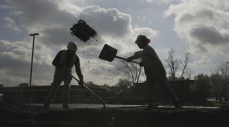 A C.W. Matthews Construction Co. paving crew works in Smyrna in March 2007.
