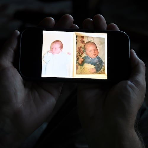 Jeremy Morrison, who says he was sent home with the wrong parents after he was born, shows what he believes is a baby photo of him, left, and of the other baby he says was switched at birth while recounting the story at his home in Colorado City, Colo., on Thursday, July 16, 2026. (AP Photo/Thomas Peipert)