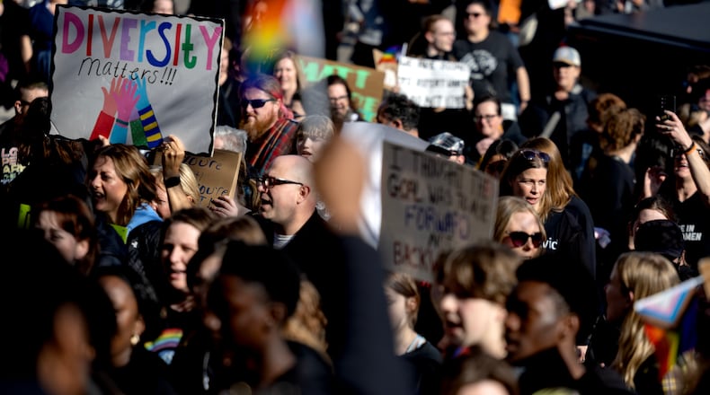 Demonstrators make their way on April 22 to the Sandburg Education Center during A Youth for Unity rally and march before an Anoka-Hennepin school board meeting in Anoka, Minnesota. (Carlos Gonzalez/Minneapolis Star Tribune/TNS)
