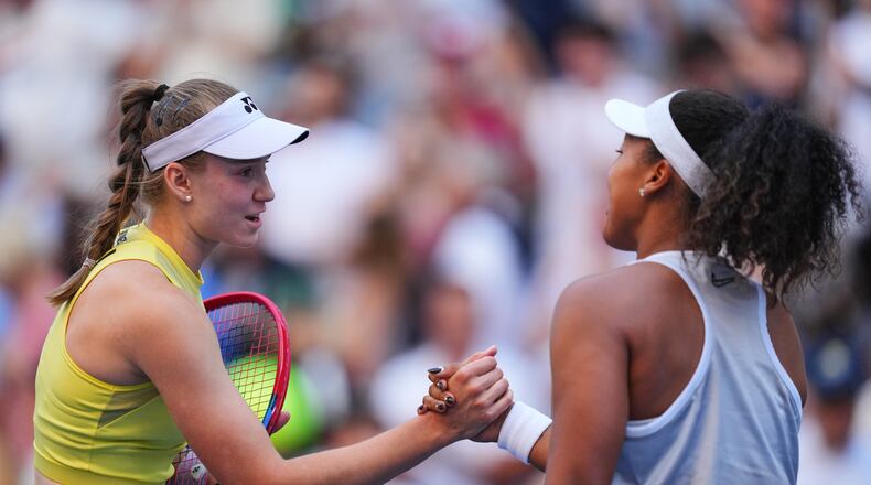 Elena Rybakina, of Kazakhstan, left, greets Naomi Osaka, of Japan, after winning a match during the fourth round of the U.S. Open tennis championships, Monday, Sept. 7, 2026, in New York. (AP Photo/Kirsty Wigglesworth)