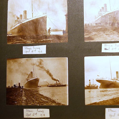 FILE - Photographs of the Titanic are displayed in a family album at the Transport museum in Belfast, Northern Ireland, Tuesday, Oct. 14, 2014. (AP Photo/Peter Morrison, File)
