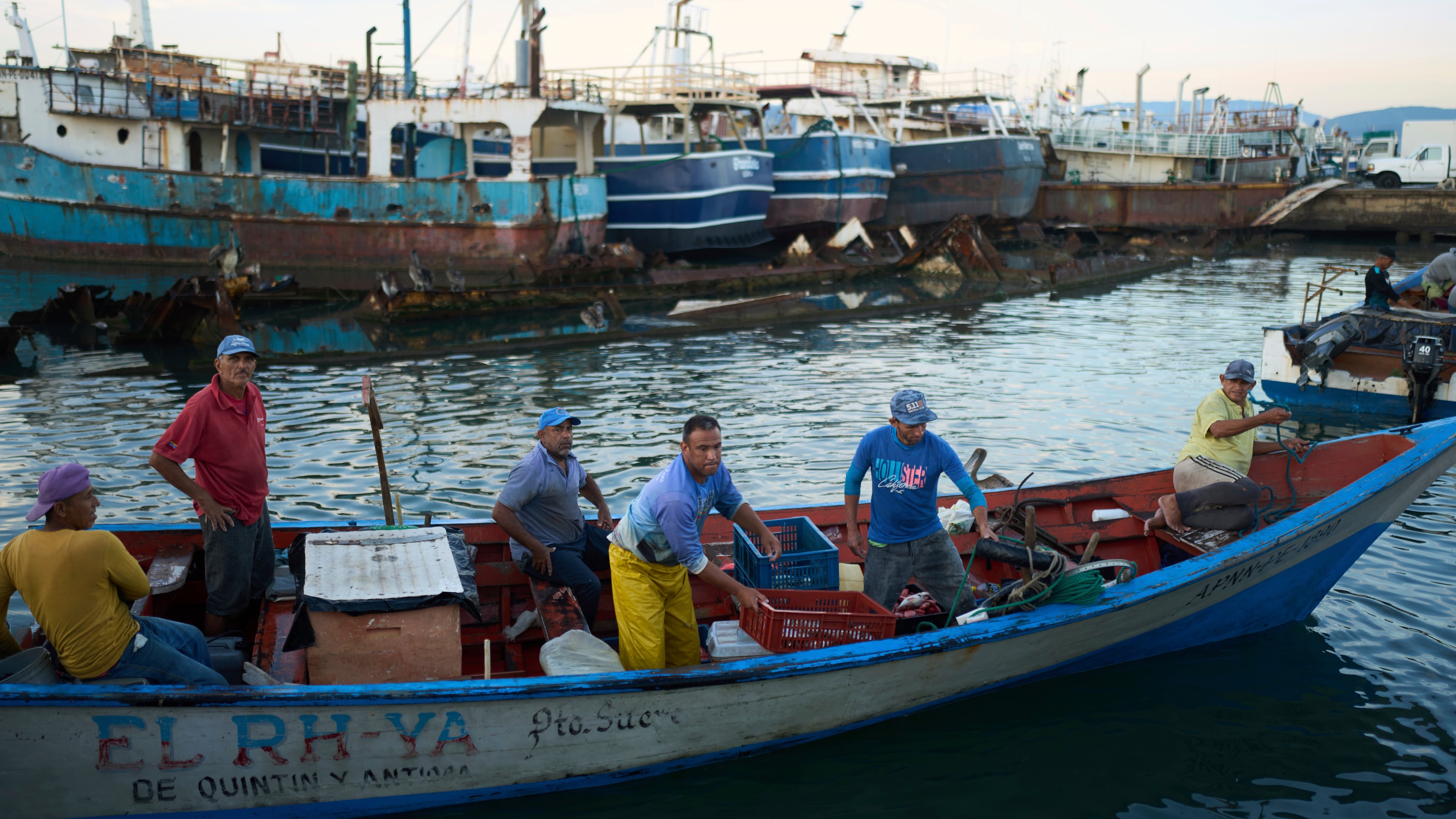 Fishermen arrive at the port in Cumana, capital of Venezuela's Sucre state, Monday, Sept. 15, 2025. (AP Photo/Ariana Cubillos)