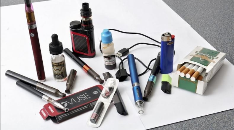 These vaporizers are popular among young people and were confiscated at a high school in Ohio. The Food and Drug Administration is cracking down on sales of vaping products to minors. ERIC ALBRECHT / DISPATCH
