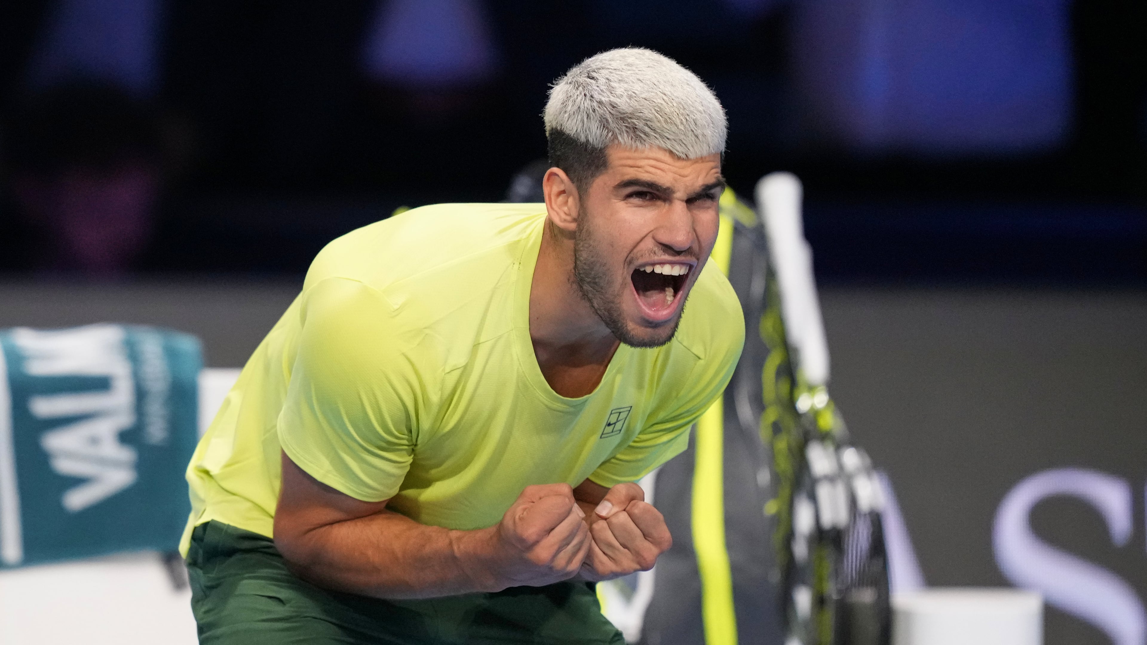 Spain's Carlos Alcaraz celebrates after winning against Italy's Lorenzo Musetti during the tennis match of the ATP World Tour Finals, in Turin, Italy, Thursday, Nov. 13, 2025. (AP Photo/Antonio Calanni)
