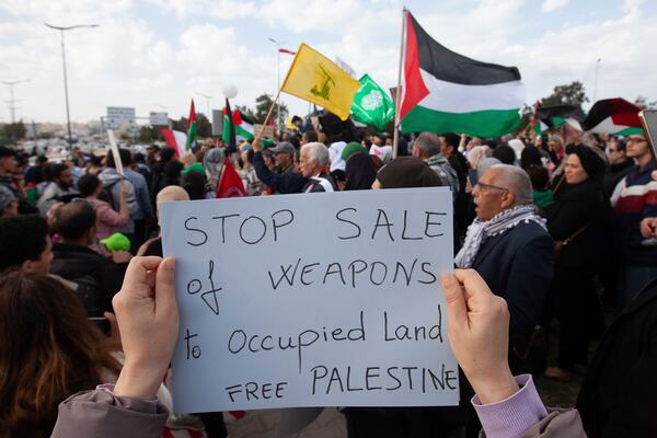 Protesters gather outside the U.S. Embassy to condemn U.S., British, and Israeli military actions in Palestine, Yemen, and Syria, Saturday, April 5, 2025 in Tunis. (AP Photo/Ons Abid) f