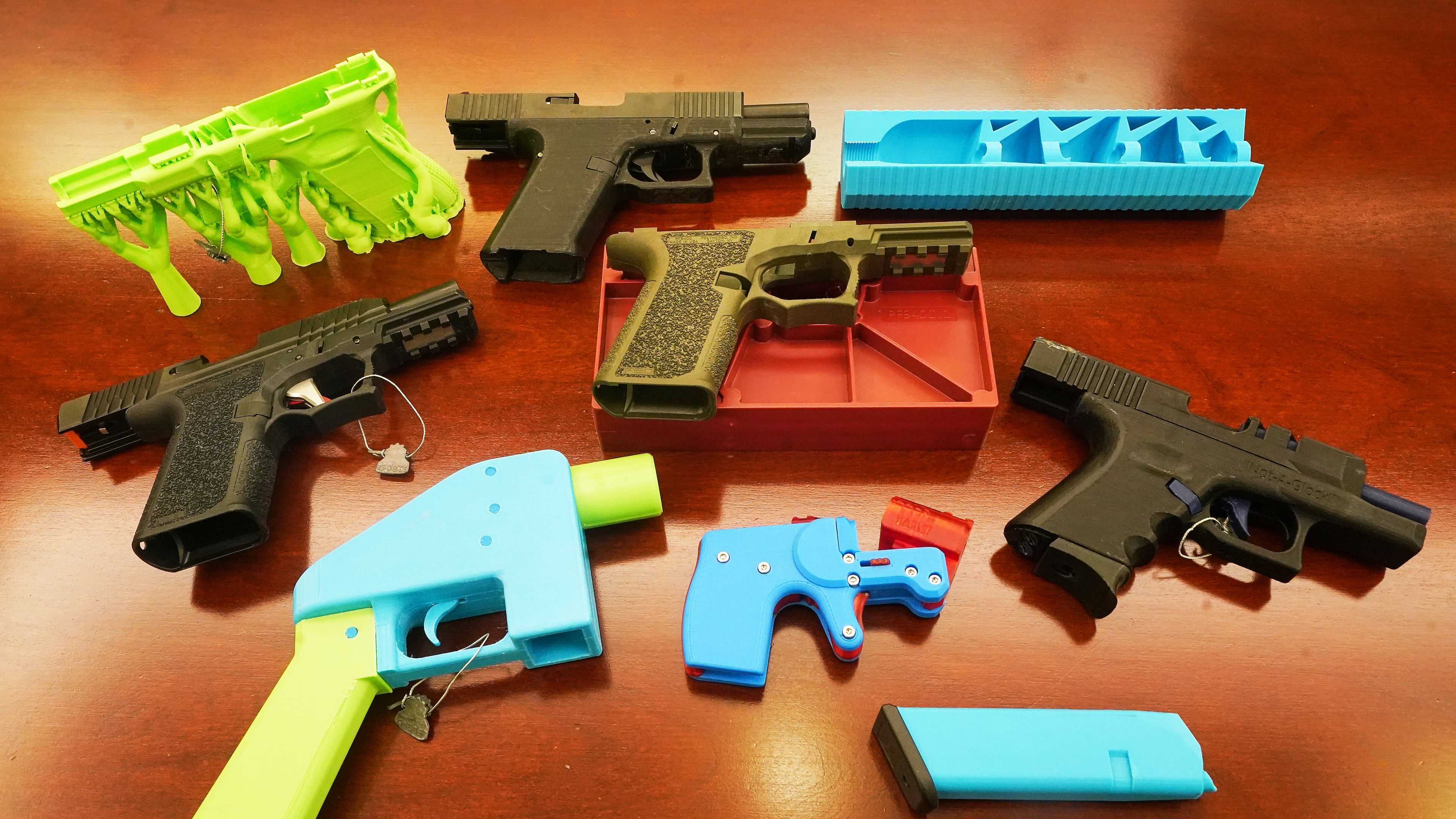 Ghost guns, provided by the New York City Police Department, are displayed in the Manhattan District Attorney's office, in New York, Wednesday, Oct. 15, 2025. (AP Photo/Richard Drew)