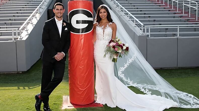 True story: These two Georgia Bulldogs met through their dogs at a dog park. (Courtesy of Blane Marable Photography)