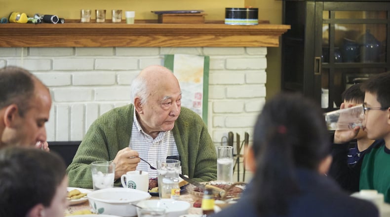 A scene from a pierogi party that Ligaya Figueras organized for her half-Polish father in late 2011. “It was a time when he still, mostly, had the capacity to act as a head of household,” Figueras writes. CONTRIBUTED BY GREG RANNELLS