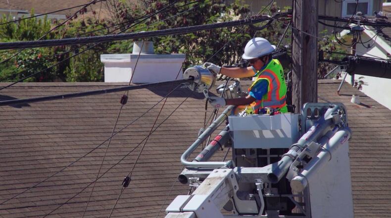 AT&T, Comcast and EarthLink say internet speeds are holding up as more people work and study from home, but industry data says the network is starting to feel the strain. FILE PHOTO