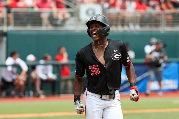 Designated hitter Tre Phelps celebrates a three-run homer.
