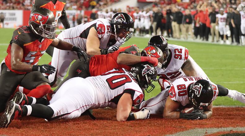 Levine Toilolo recovers Devonta Freeman’s end-zone fumble for a touchdown.