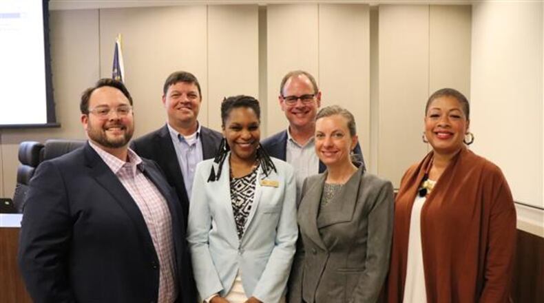 Decatur's school board left to right, James Herndon, Superintendent David Dude, Tasha White, Board Chair Lewis Jones, Heather Tell and Jana Johnson-Davis. Courtesy City Schools of Decatur