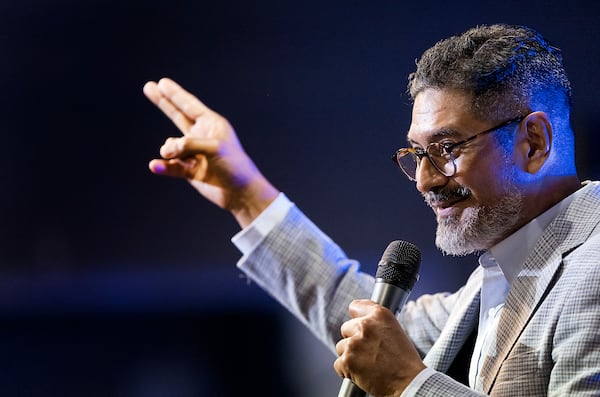 José Luis Orozco, a pastor from Nicaragua, ministers to members of the Oasis Church, in Taylor, Texas, June 15, 2025. (AP Photo/Rodolfo Gonzalez)