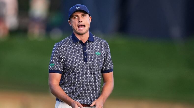 Ludvig Aberg of Sweden reacts after missing a putt on the 17th green during the third round of The Players Championship golf tournament Saturday, March 14, 2026, in Ponte Vedra Beach, Fla. (AP Photo/Gerald Herbert)