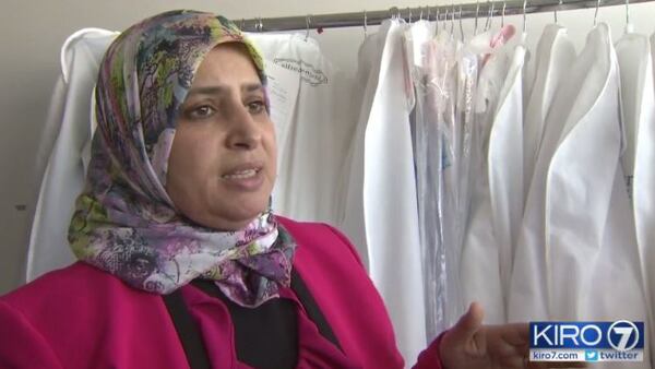 Seamstress Mina Baayoud has continued to work to finish gowns for brides-to-be despite Alfred Angelo Bridal closing its stores and filing for bankruptcy July 14.