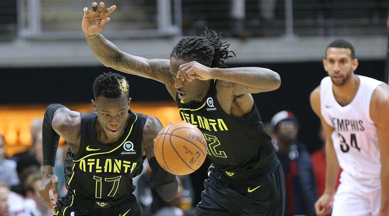 Feb 06, 2018 Atlanta: Hawks Dennis Schroder and Taurean Prince steal from the Grizzlies in a NBA basketball game on Tuesday, Feb 6, 2018, in Atlanta.     Curtis Compton/ccompton@ajc.com