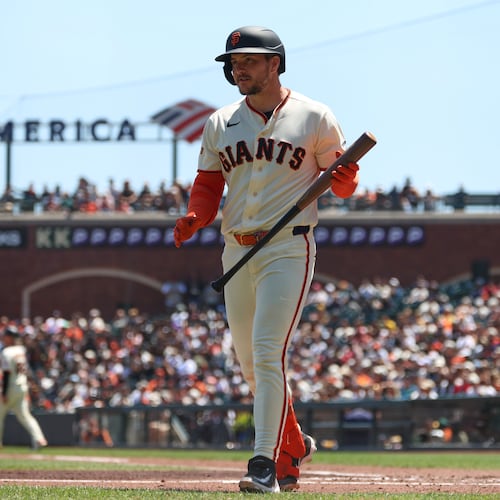 San Francisco Giants' Patrick Bailey walks back to the dugout after striking out against the San Diego Padres during the third inning of a baseball game in San Francisco, Wednesday, May 6, 2026. (AP Photo/Jed Jacobsohn)