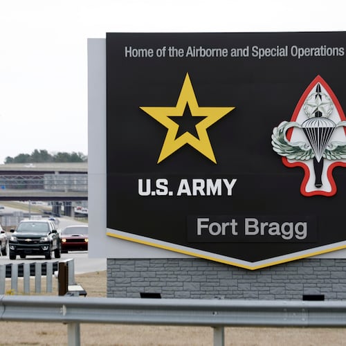 FILE - A sign for Fort Bragg is seen, March 7, 2025, in Fort Bragg, N.C. (AP Photo/Chris Seward, File)