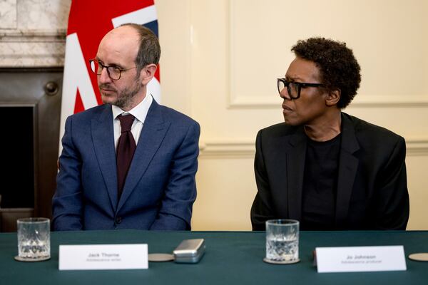 Adolescence writer Jack Thorne, left, and producer Jo Johnson attend a roundtable meeting with British Prime Minister Keir Starmer at Number 10 Downing Street in London, Monday March 31, 2025. (Jack Taylor/Pool Photo via AP)
