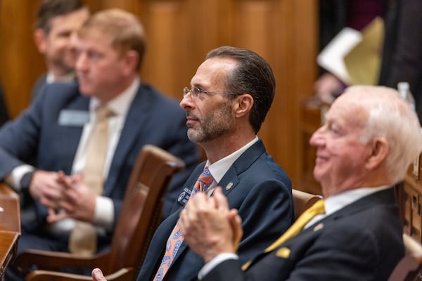 State Sen. Jason Dickerson (center), R-Canton, is not a fan of lab grown meat. (Arvin Temkar/AJC)