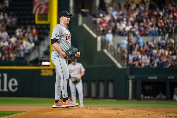 Detroit Tigers pitcher Tarik Skubal smiles during the first inning of a baseball game against the Texas Rangers, Sunday, July 20, 2025, in Arlington, Texas. (AP Photo/Jessica Tobias)