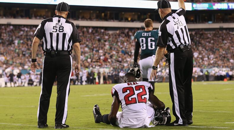 Keanu Neal of the Falcons sits on the ground after suffering an apparent injury during the first half against the Philadelphia Eagles at Lincoln Financial Field on September 6, 2018 in Philadelphia. (Photo by Mitchell Leff/Getty Images)