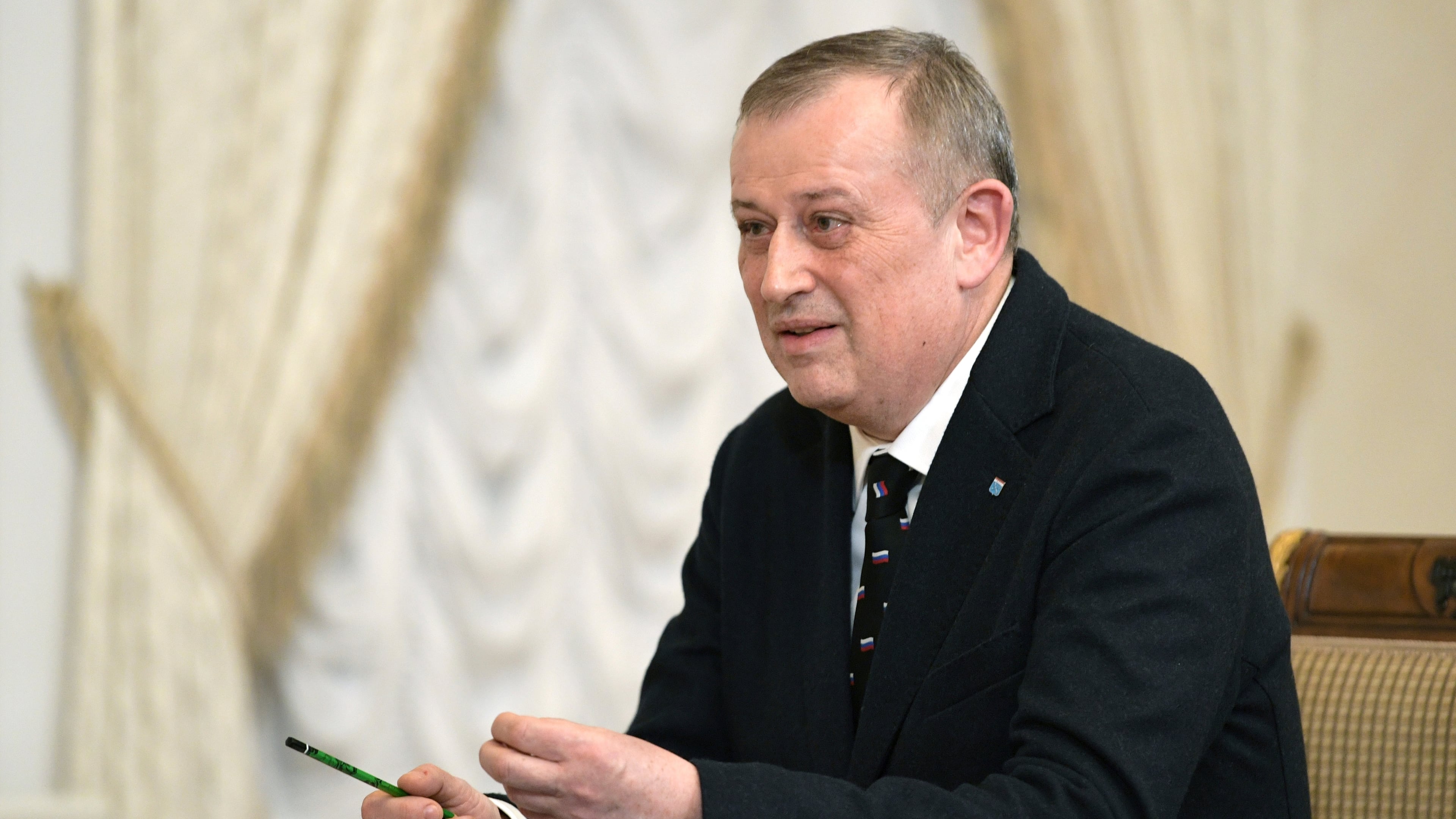 FILE - Leningrad Region Governor Alexander Drozdenko speaks to Russian President Vladimir Putin during their meeting in St. Petersburg, Russia, Monday, Jan. 29, 2024. (Alexei Danichev, Sputnik, Kremlin Pool Photo via AP, File)