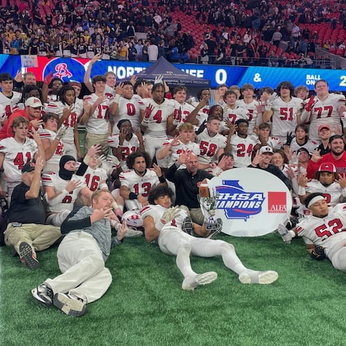 Bowdon players and coaches celebrate their victory over Brooks County in the Class A Division II championship game at Mercedes-Benz Stadium on Monday, Dec. 16, 2024, in Atlanta. Bowdon has a chance to become only the fourth team in history to win four straight.