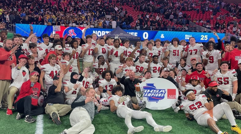 Bowdon players and coaches celebrate their 34-14 victory over Brooks County in the Class A Division II championship game at Mercedes-Benz Stadium on Dec. 16, 2024.