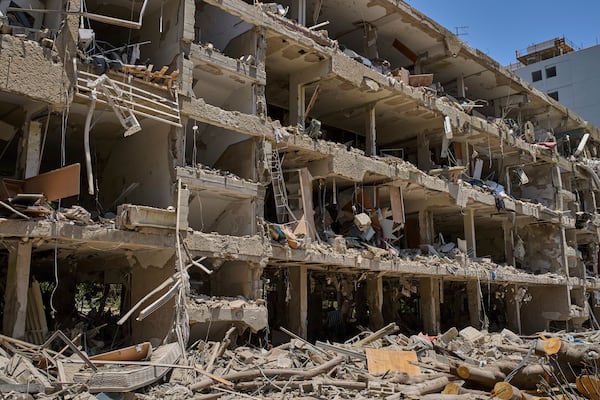 A damaged building after a missile strike launched from Iran in Tel Aviv, Israel, on Sunday, June 22, 2025. (AP Photo/Bernat Armangue)