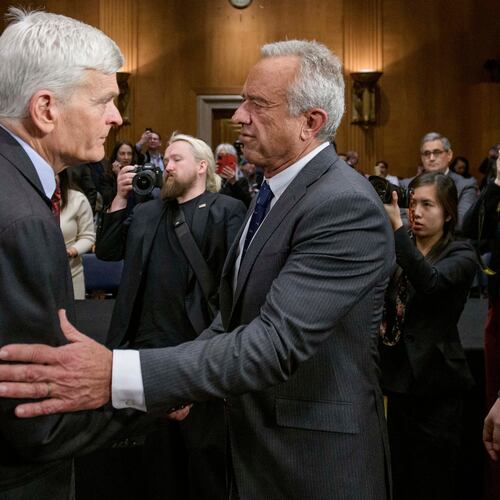 FILE - Robert F. Kennedy, Jr., right, President Donald Trump's nominee to serve as Secretary of Health and Human Services, talks with Committee Chairman Sen. Bill Cassidy, R-La., following his confirmation hearing on Capitol Hill, Jan. 30, 2025, in Washington. (AP Photo/Rod Lamkey, Jr., File)