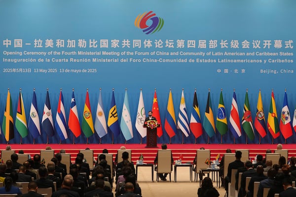 Chilean President Gabriel Boric delivers his speech on stage during the opening ceremony of the Fourth Ministerial Meeting of the Forum of China and Community of Latin American and Caribbean States at China National Convention Center in Beijing, Tuesday, May 13, 2025. (AP Photo/Andy Wong)