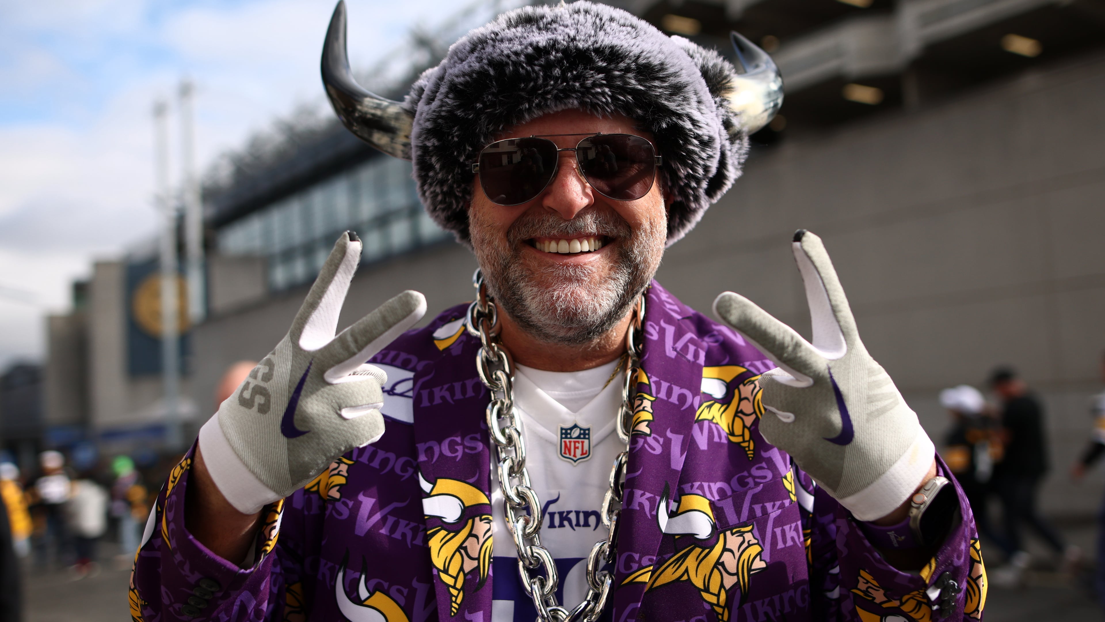 A supporter poses for photographers before the start of the NFL football game between Minnesota Vikings and Pittsburgh Steelers at Croke Park stadium in Dublin, Sunday, Sept. 28, 2025.(AP Photo/Peter Morrison)